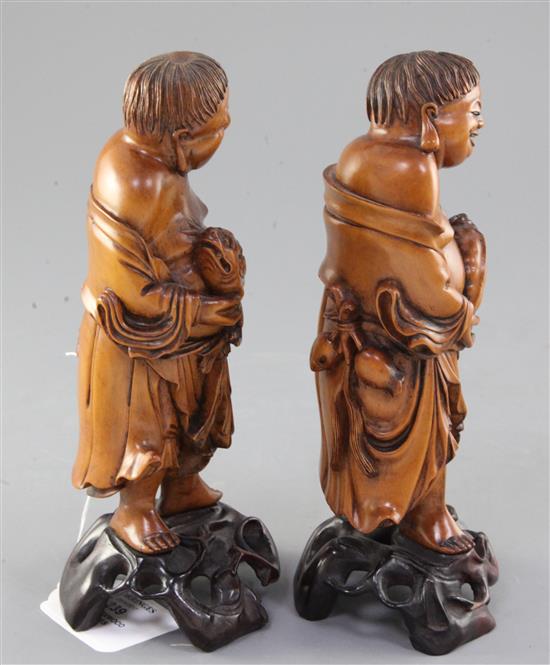 A pair of Chinese boxwood figures of Liu Hai, 19th century, height 21cm